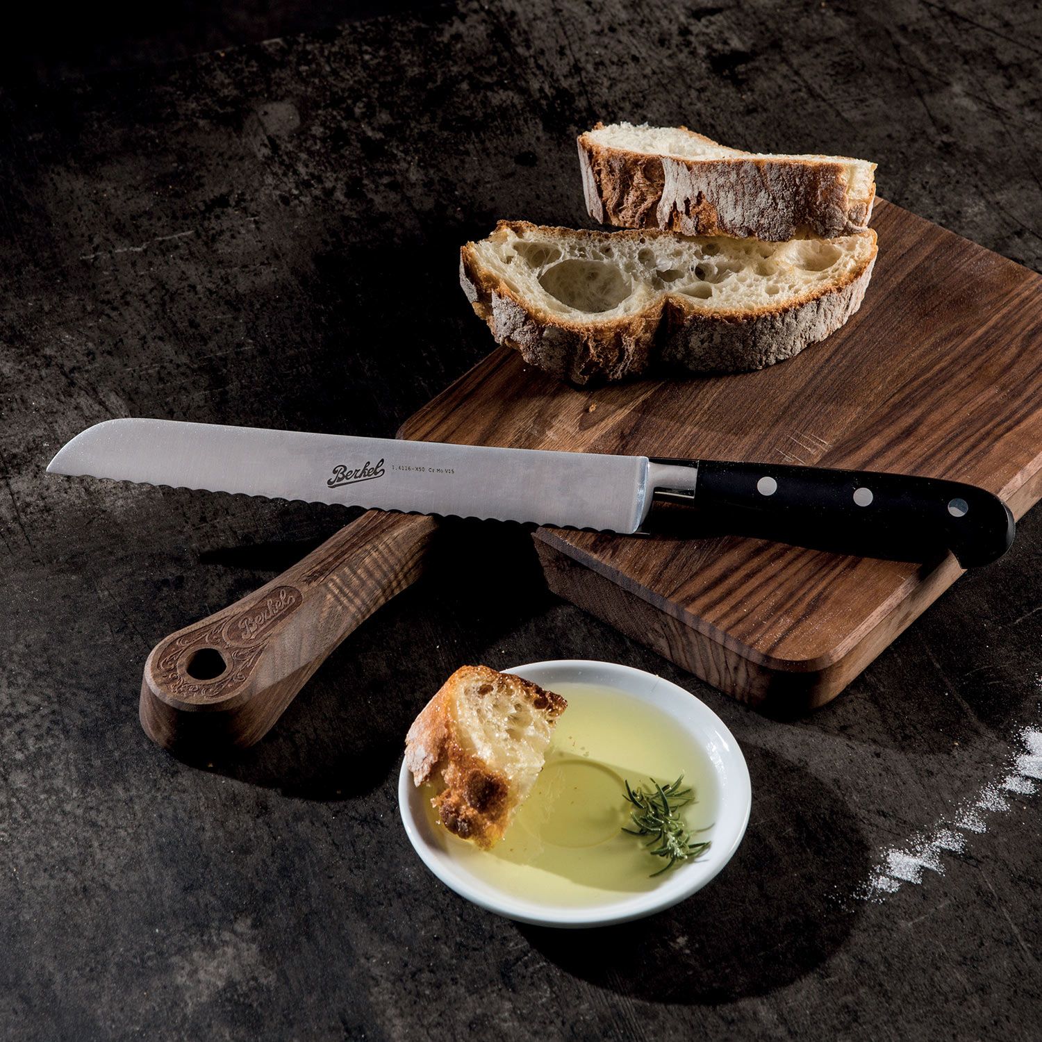 Bread knife cm.22 Stainless Steel Berkel Adhoc Handle Glossy Black Resin